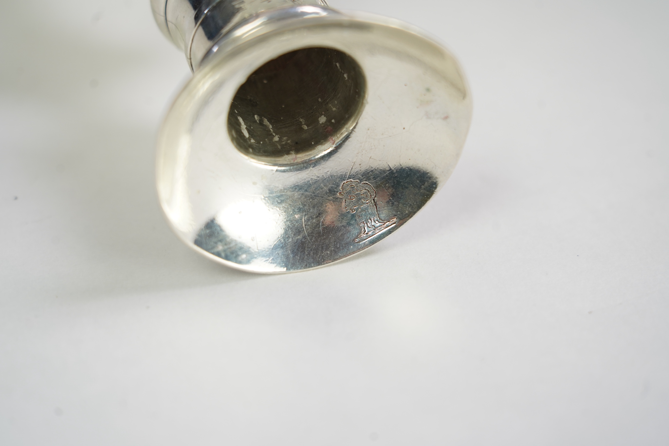 A pair of George II cast silver candlesticks, by Susannah Hatfield